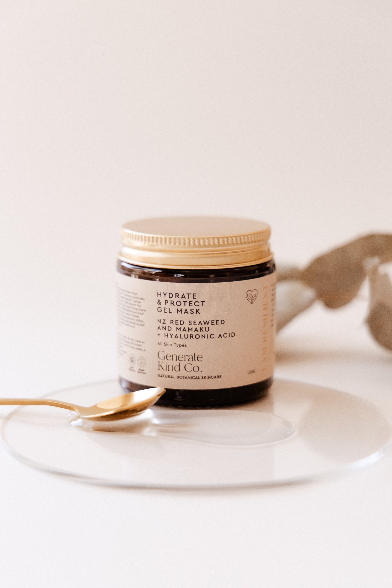 Jar of hydrate gel mask skincare on a white plate with a neutral background