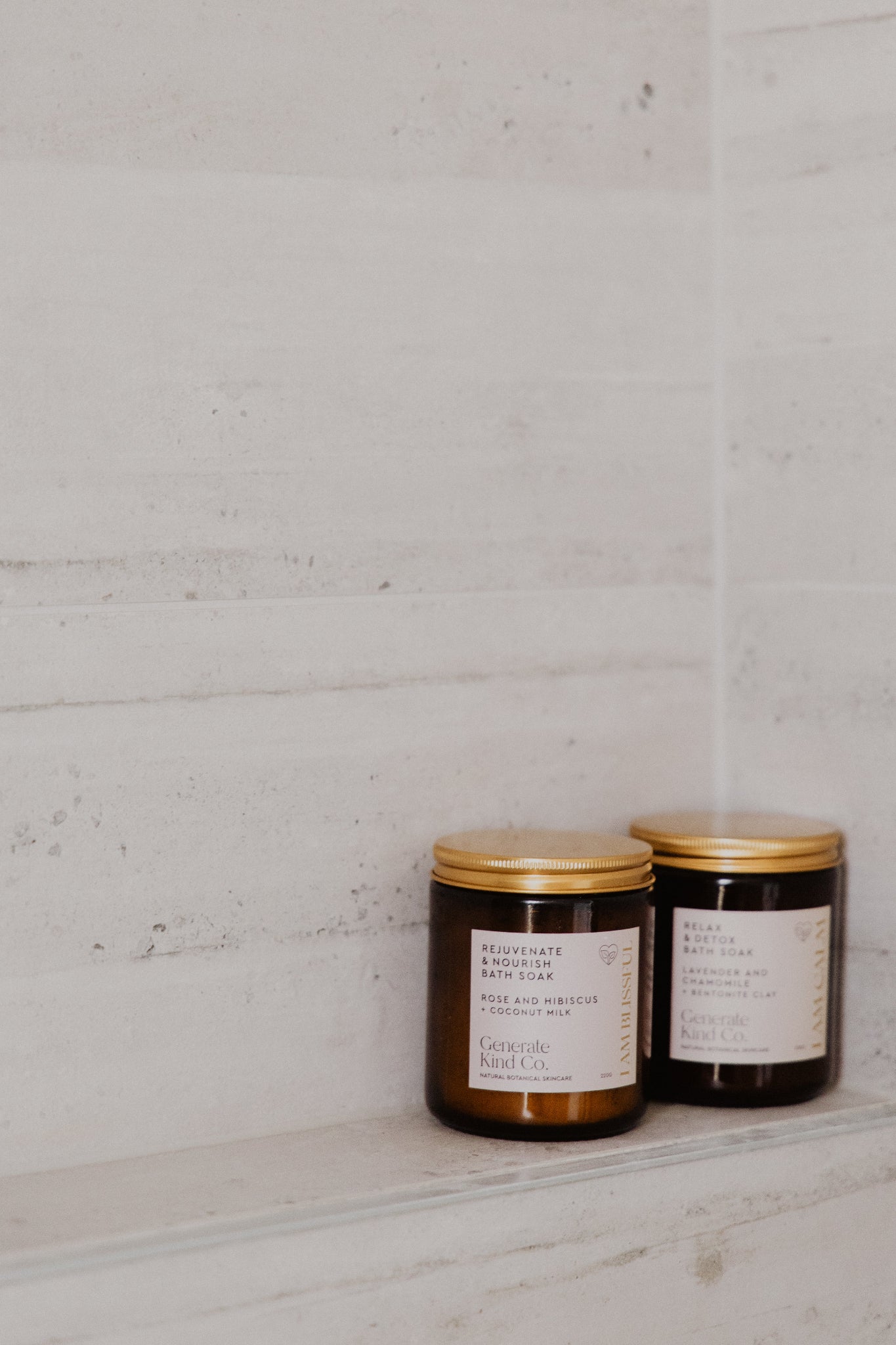 Generate kInd Co. Bath soak on tiled bathroom shelf