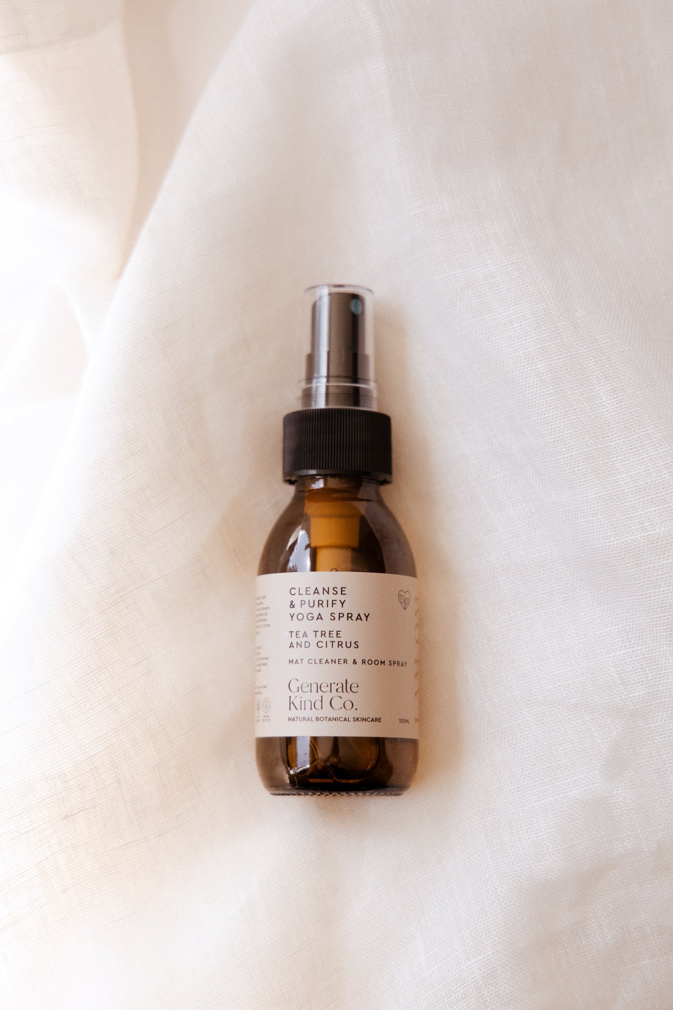 Yoga Mat Cleaner and Room Spray on Laying on Linen Fabric