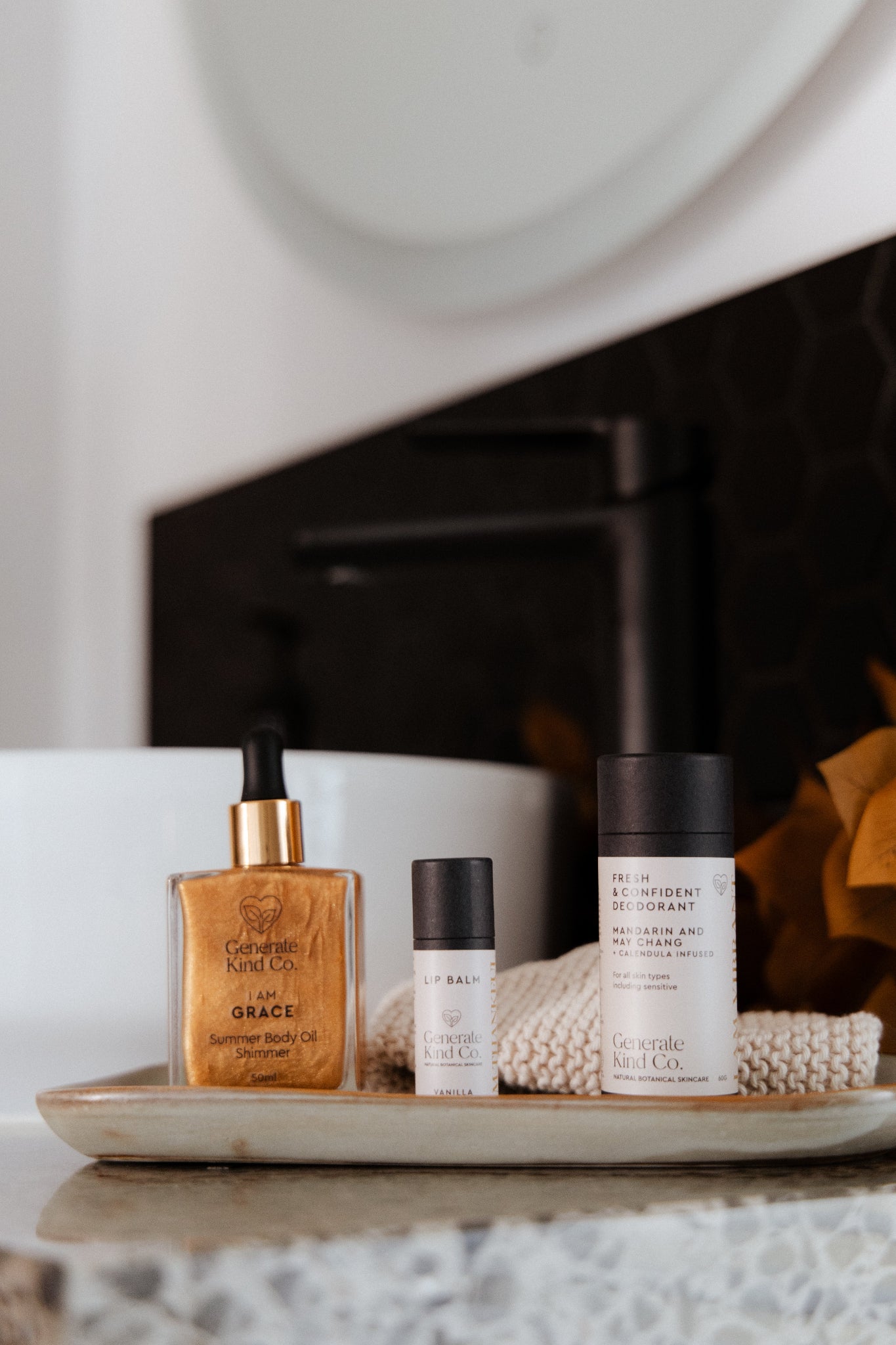 Set of Generate Kind CO. skincare products on a tray 